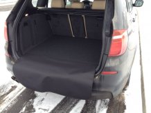 Textilní koberce do kufru auta s nášlapem VW Passat 3C combi 2005 - 2014 Carfit (4947-Kufr)